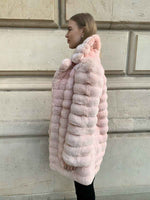 Load image into Gallery viewer, Chinchilla fur coat for women in a mellow rose tone seen from the side
