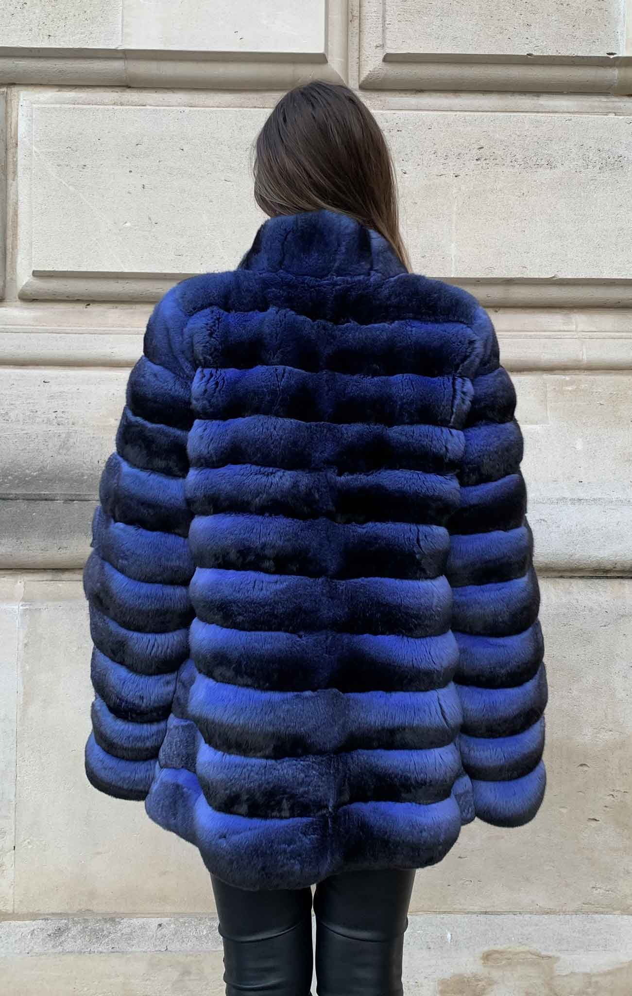 a blue chinchilla coat for women seen from the back