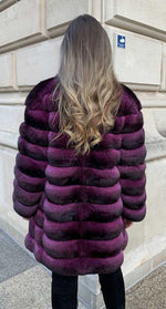 Load image into Gallery viewer, Chinchilla fur dream coat in purple for women seen from the back
