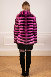 Pink chinchilla fur coat seen from the back
