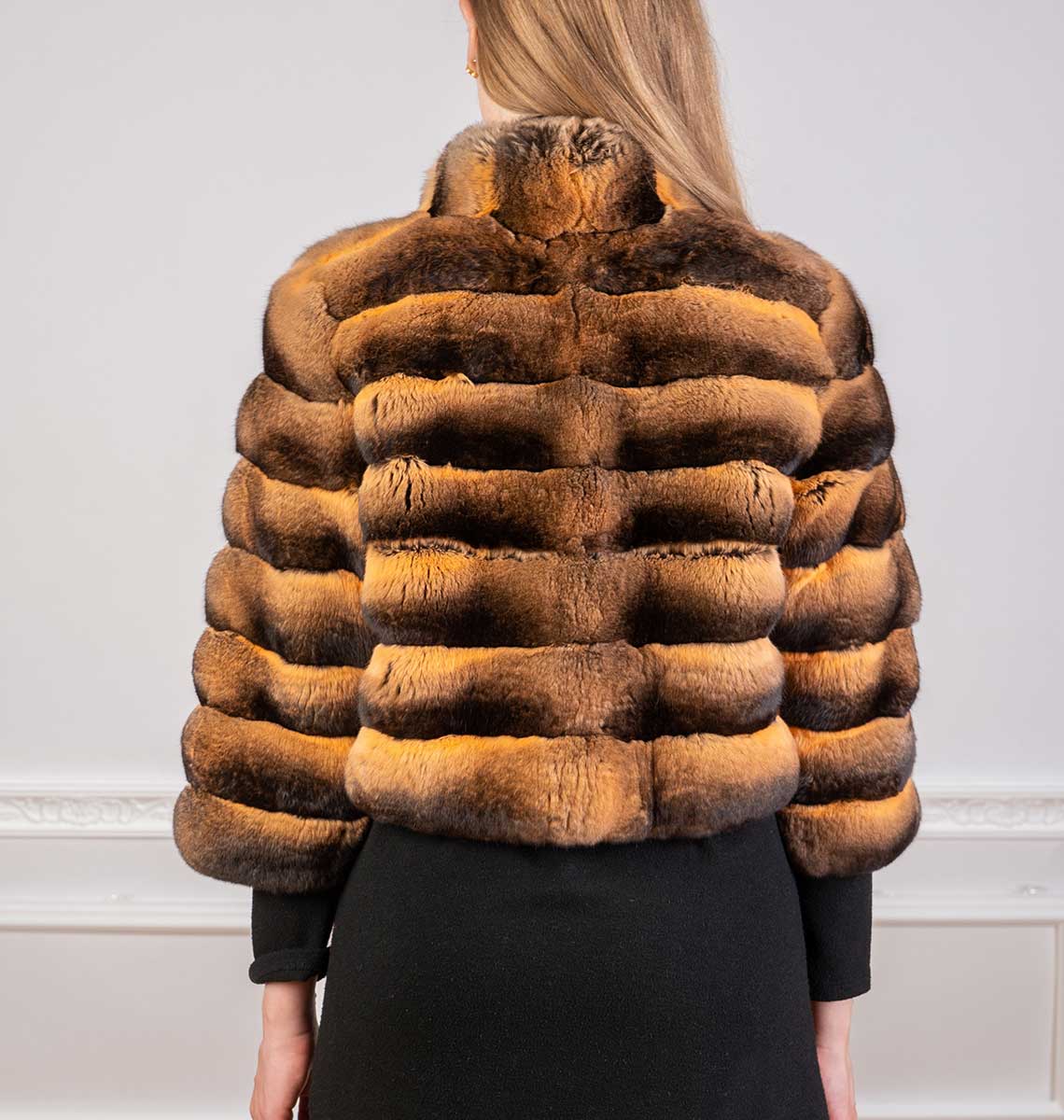 Finest chinchilla fur jacket bolero in gold tone seen from the back