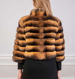 Load image into Gallery viewer, Finest chinchilla fur jacket bolero in gold tone seen from the back

