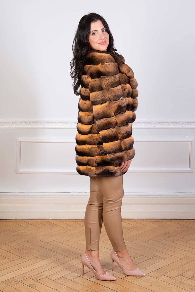 Gold tone chinchilla fur coat seen from the side