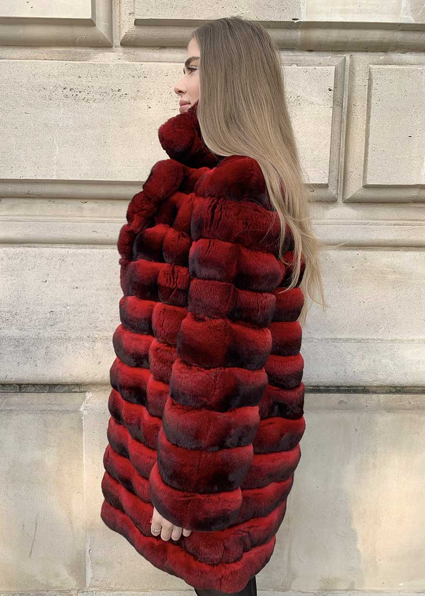 Red colored chinchilla fur coat for women seen from the side