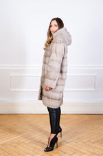 Load image into Gallery viewer, Saga Mink fur coat in natural pale silverblue for women seen from the side
