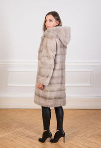 Saga Mink fur coat in natural pale silverblue for women seen from the back