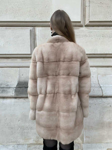 Palomino mink natural colored coat from Saga furs seen from the back