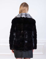 Load image into Gallery viewer, Scandinavian mink jacket in dyed black colour combined with the softest chinchilla fur seen from the back
